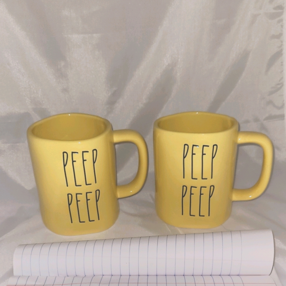 Two Rae Dunn peep peep mugs